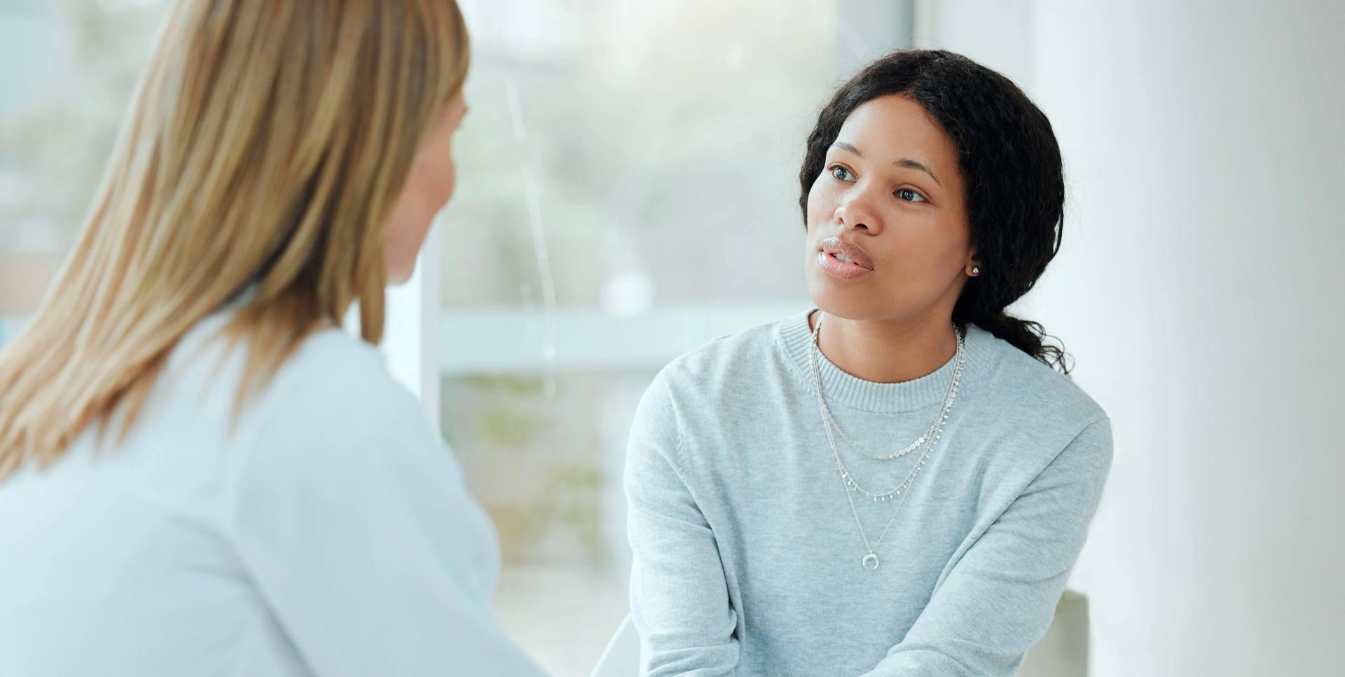 Woman receiving support from professional caregiver
