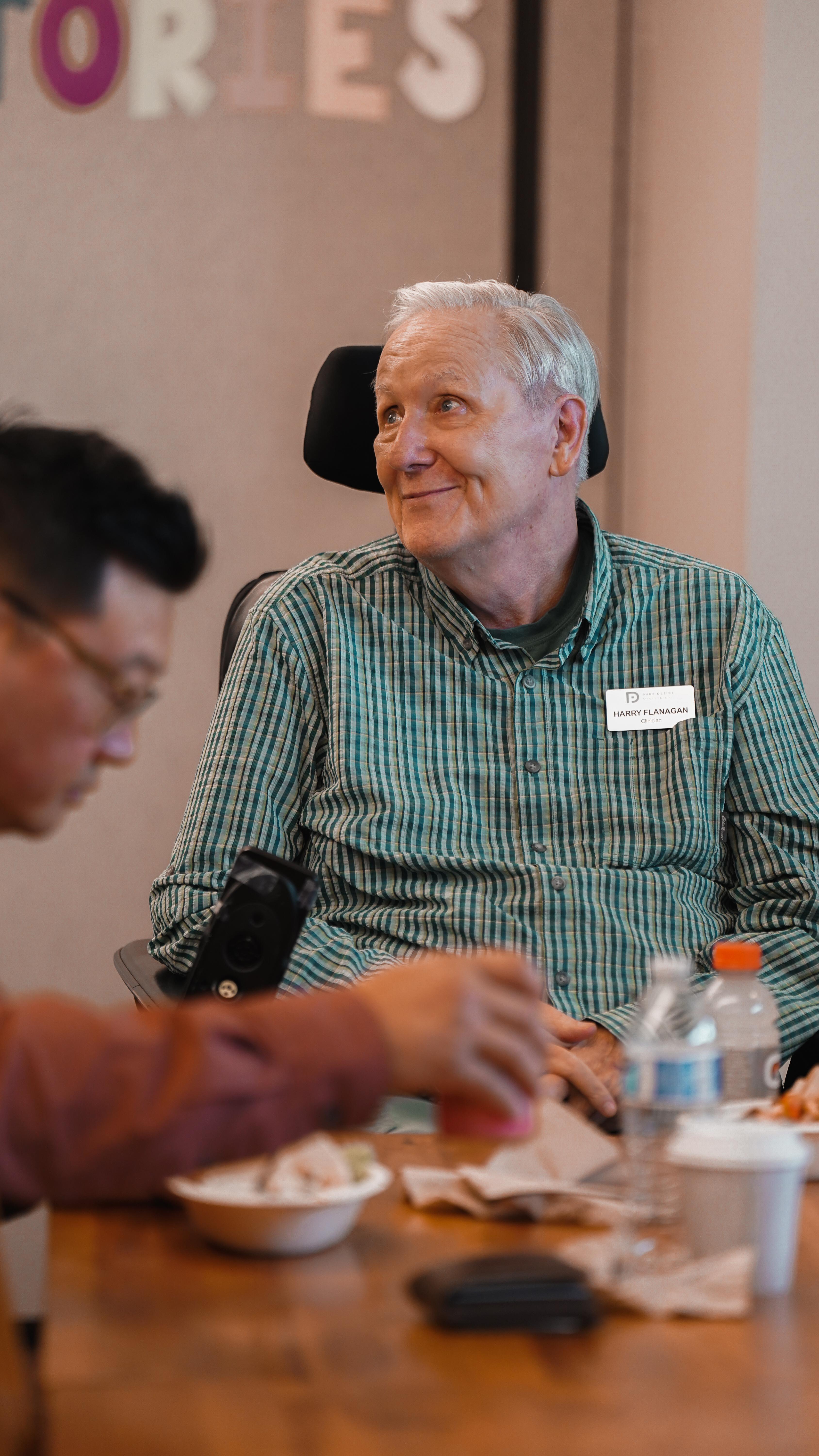 Participants engaged in a healing workshop at Pure Desire